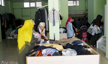 Umut Kervanından yüzlerce Suriyeli aileye giyim ve ayakkabı yardımı