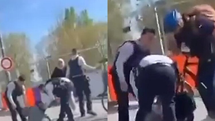 Fransız polisinden başörtülü kadınlara yol ortasında yumruklu saldırı