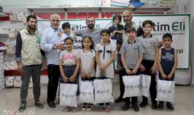 Avrupa Yetim Eli'nden giyim ve gıda yardımı